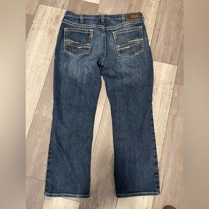 Gently worn, men’s Ariat Relaxed Fit Boot Cut jeans